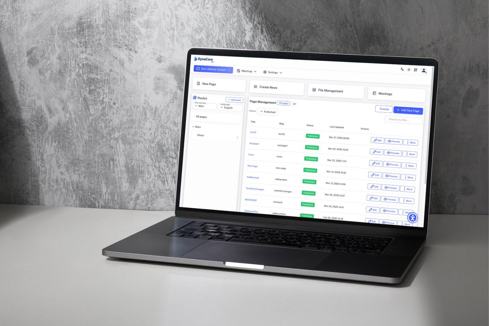 DynaCore page management dashboard on a laptop